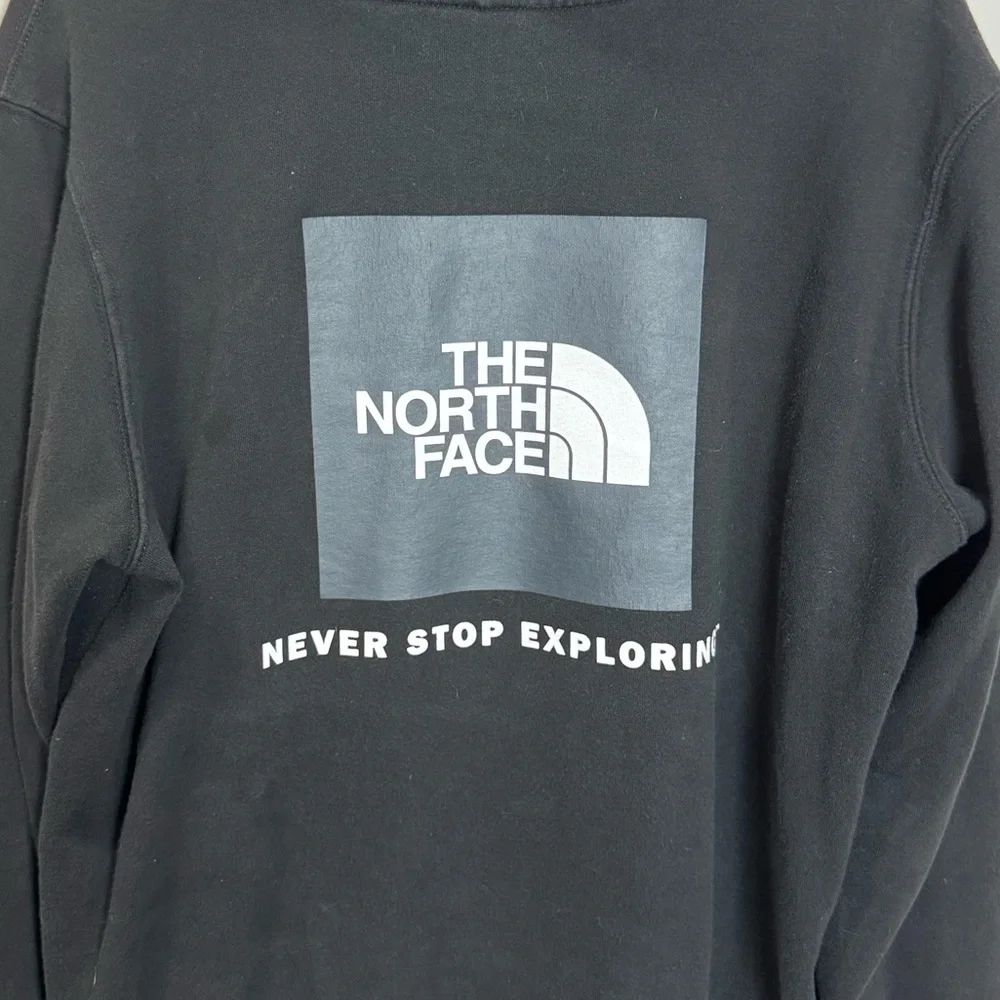 The North Face Black Hoodie | “Never Stop Exploring” Graphic | M/L
